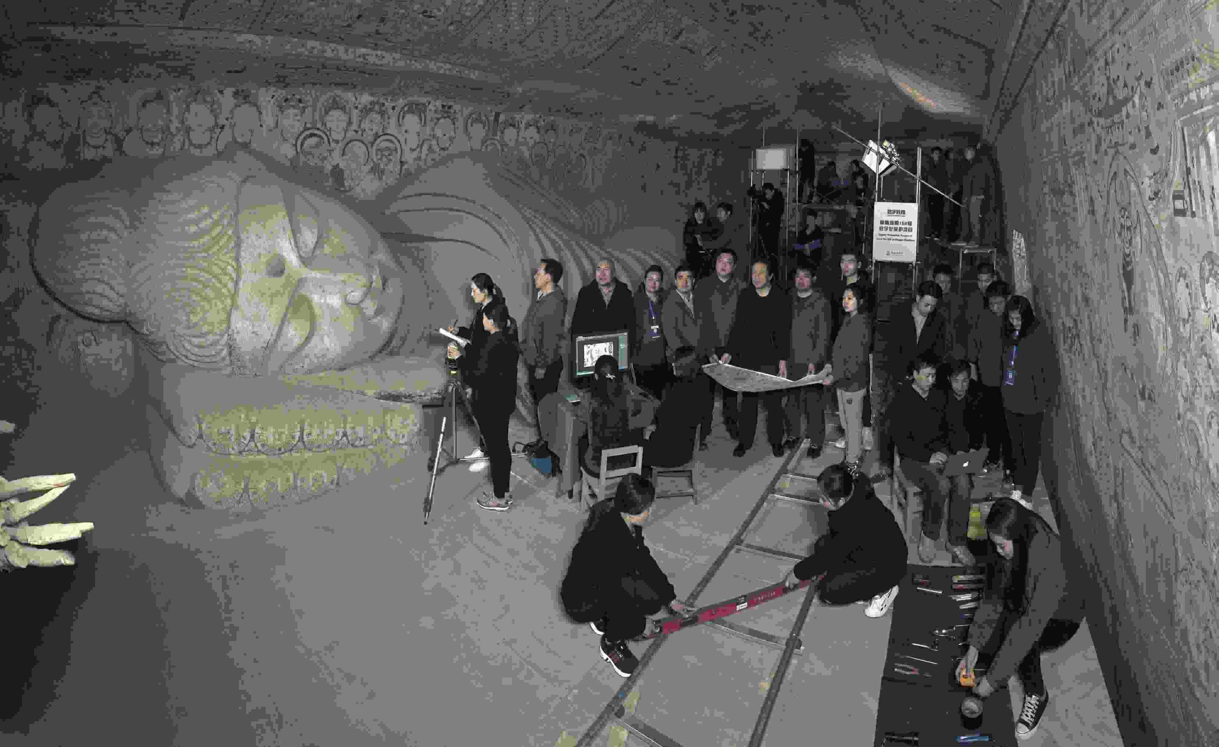 敦煌研究院文物數(shù)字化團隊在莫高窟第158窟工作現(xiàn)場。敦煌研究院供圖