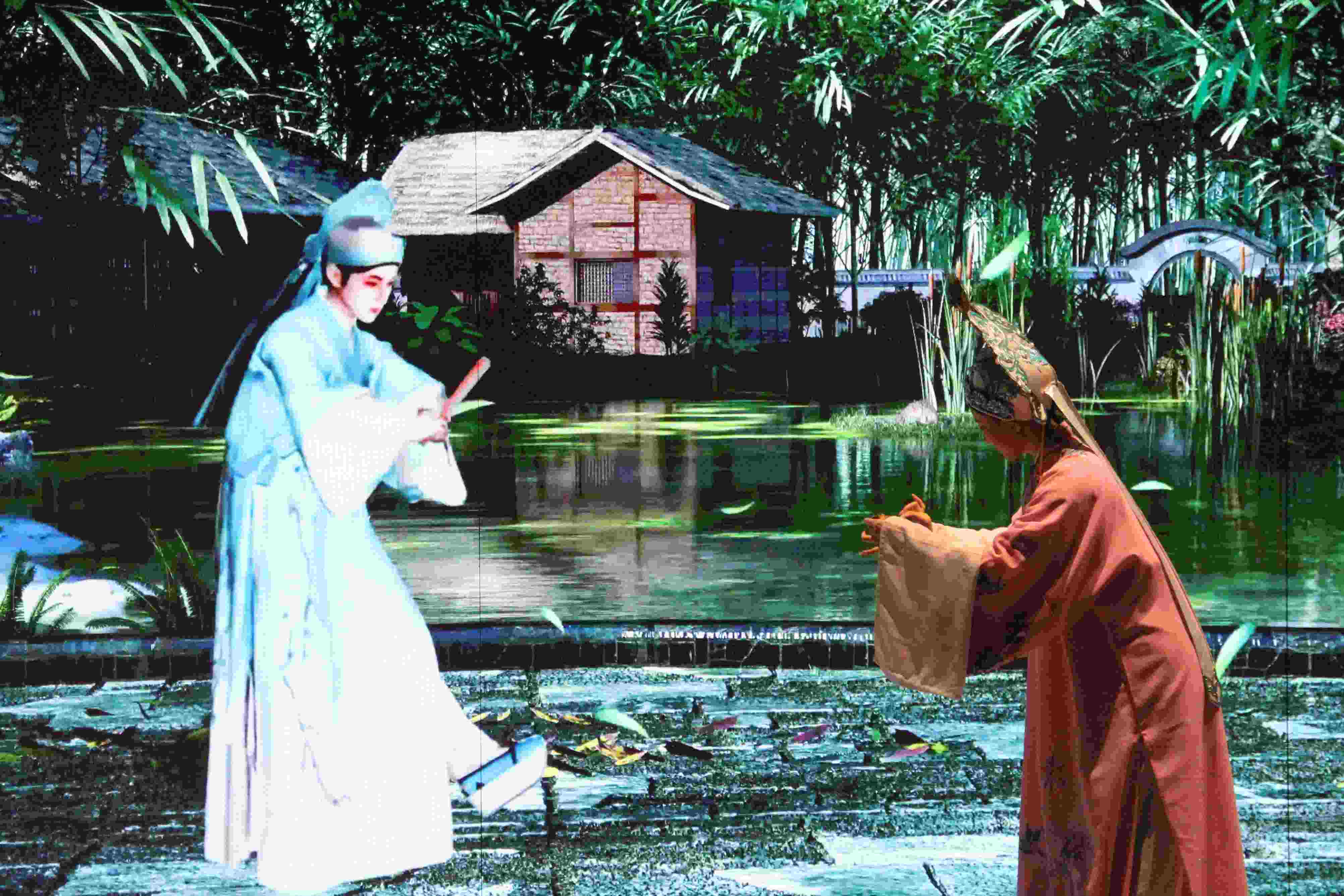 真人演員與虛擬人演員在“元啟金陵”南京數(shù)字文化客廳出演《梁山伯與祝英臺》經(jīng)典選段。受訪者供圖